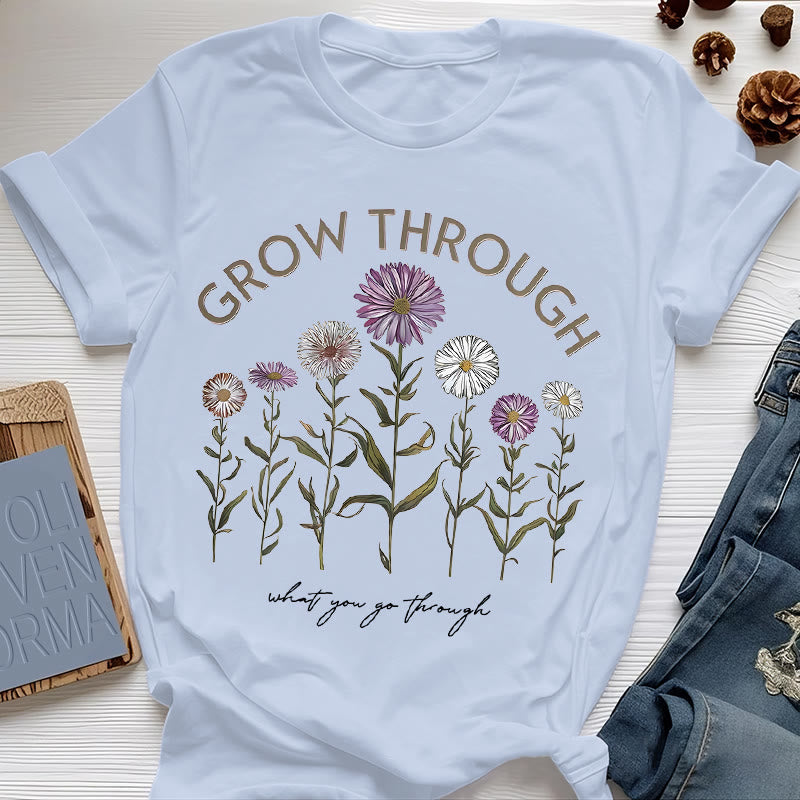 Camiseta con estampado floral "Crece a través de" de Olivenorma