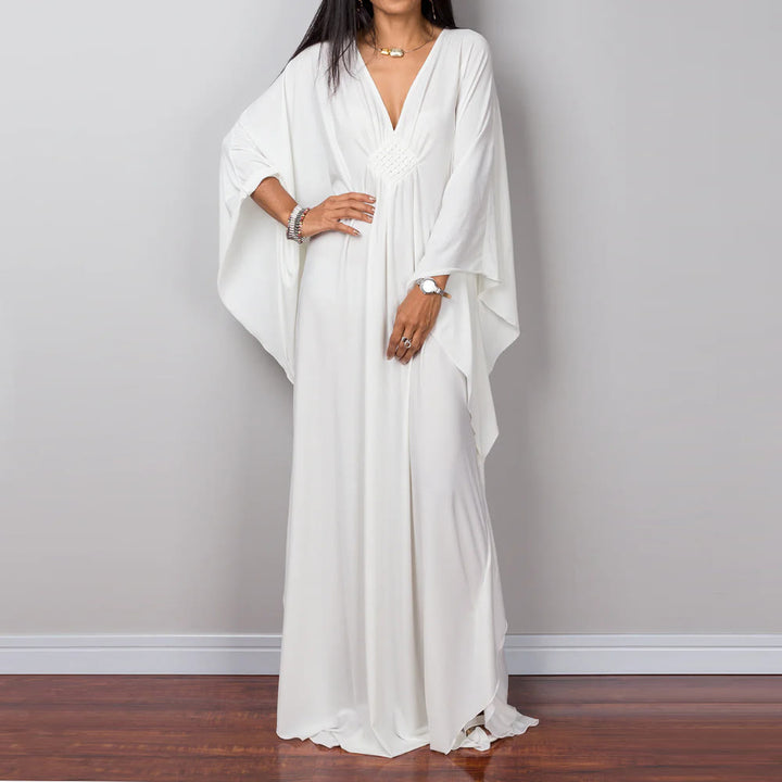 Vestido caftán con diseño tejido y camisa de protección solar de Olivenorma Beach