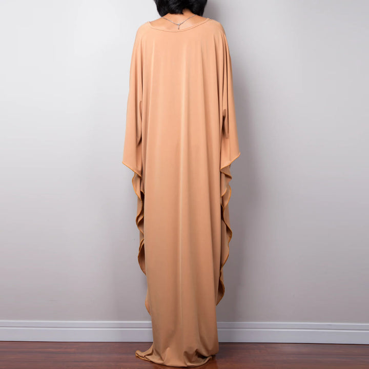 Vestido caftán con diseño tejido y camisa de protección solar de Olivenorma Beach