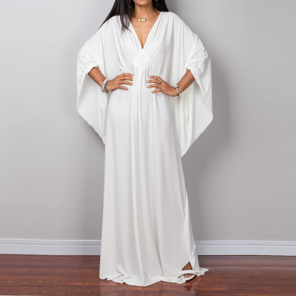 Vestido caftán con diseño tejido y camisa de protección solar de Olivenorma Beach