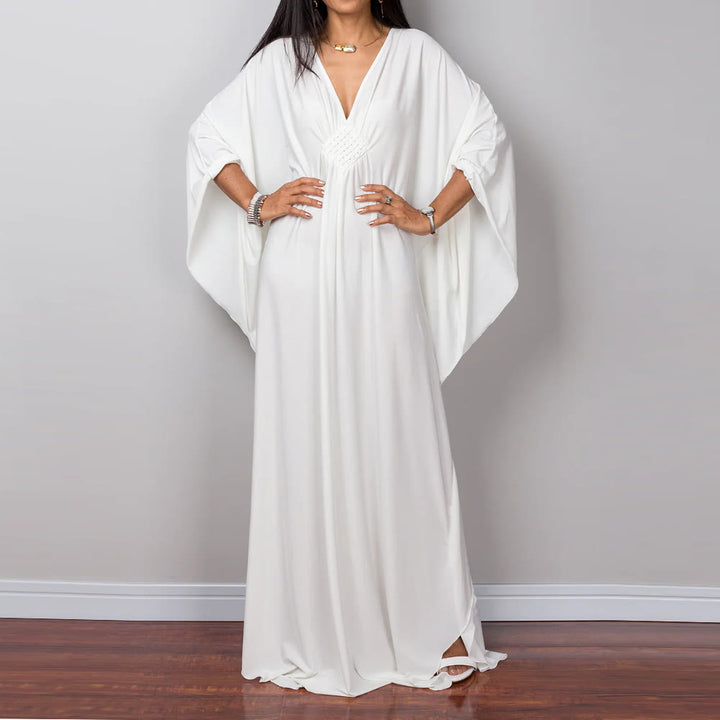 Vestido caftán con diseño tejido y camisa de protección solar de Olivenorma Beach