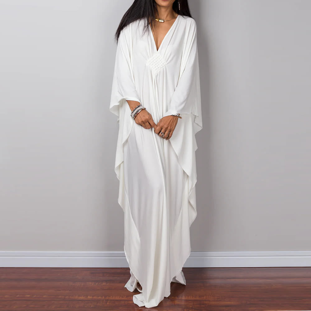 Vestido caftán con diseño tejido y camisa de protección solar de Olivenorma Beach