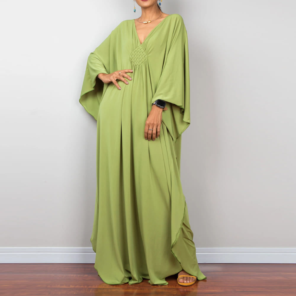 Vestido caftán con diseño tejido y camisa de protección solar de Olivenorma Beach