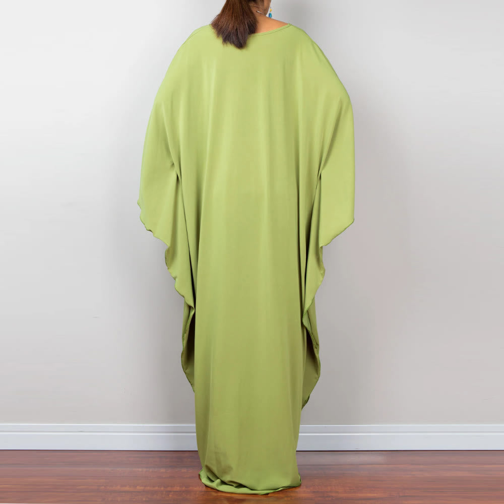 Vestido caftán con diseño tejido y camisa de protección solar de Olivenorma Beach