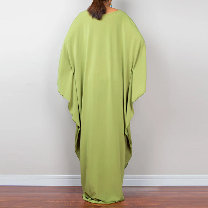 Vestido caftán con diseño tejido y camisa de protección solar de Olivenorma Beach