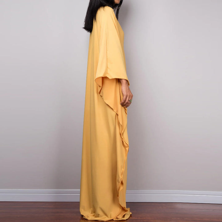 Vestido caftán con diseño tejido y camisa de protección solar de Olivenorma Beach