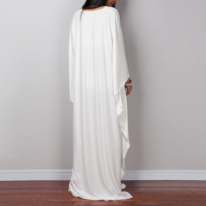 Vestido caftán con diseño tejido y camisa de protección solar de Olivenorma Beach