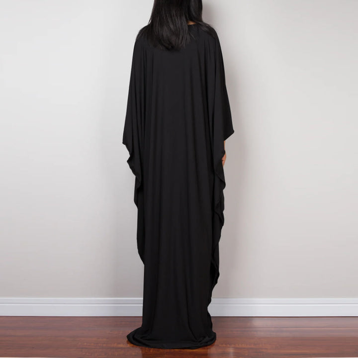 Vestido caftán con diseño tejido y camisa de protección solar de Olivenorma Beach