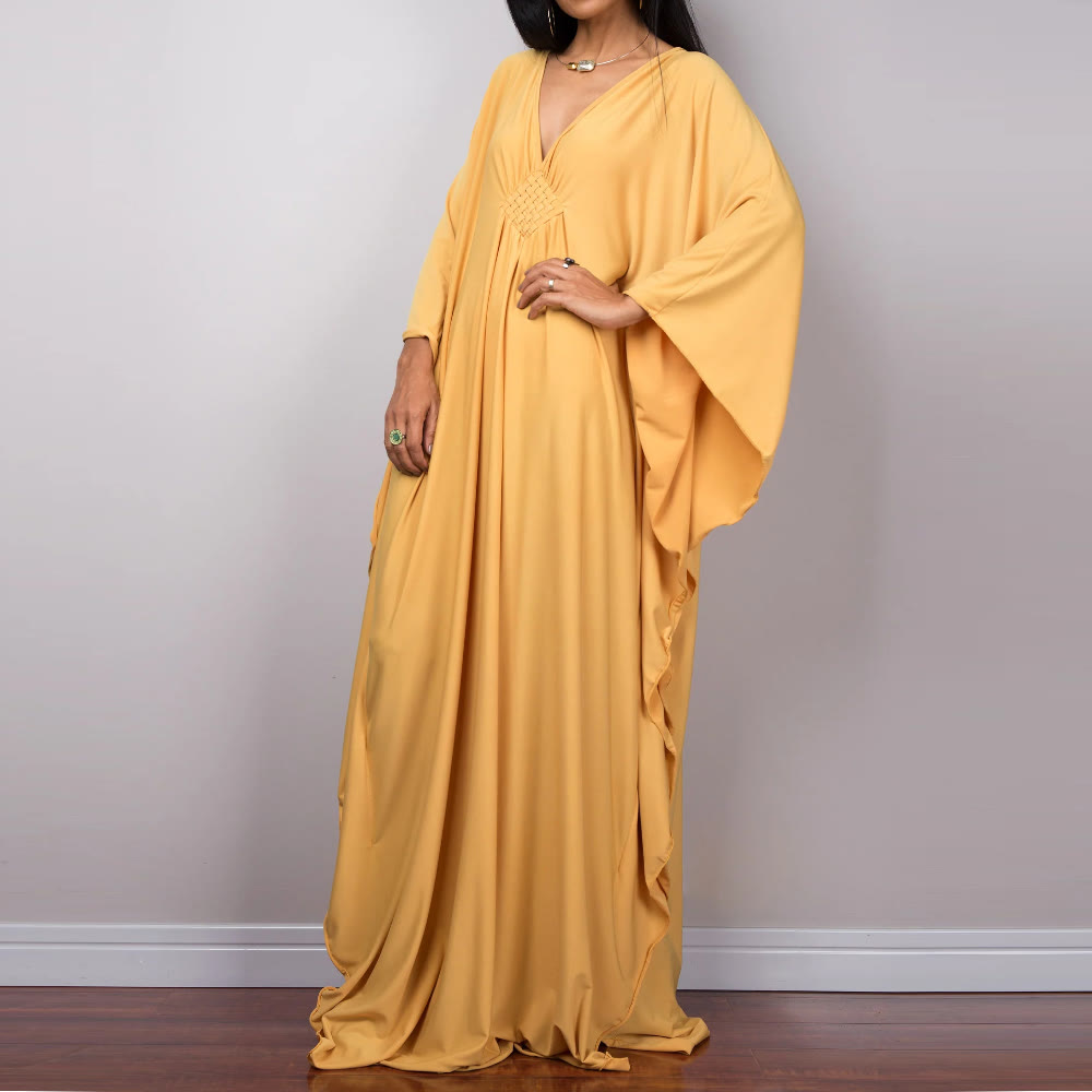 Vestido caftán con diseño tejido y camisa de protección solar de Olivenorma Beach