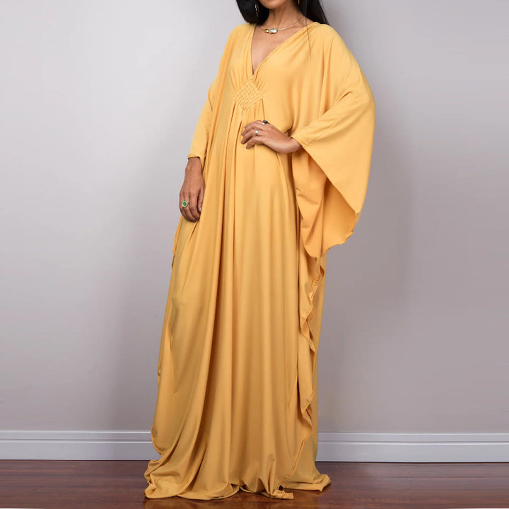Vestido caftán con diseño tejido y camisa de protección solar de Olivenorma Beach