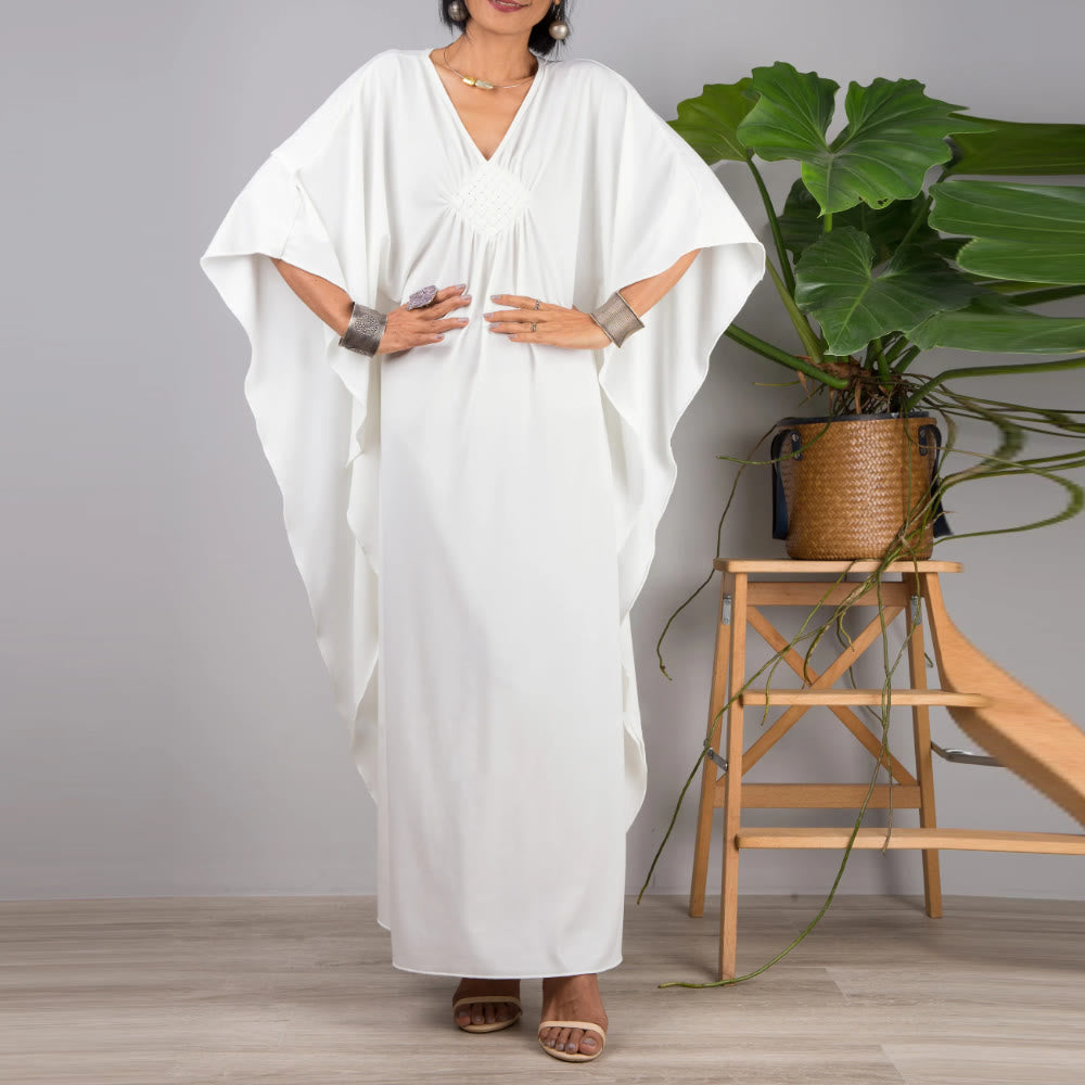 Vestido caftán con diseño tejido y camisa de protección solar de Olivenorma Beach