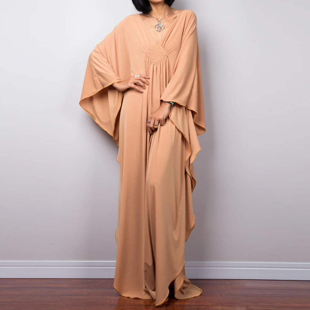 Vestido caftán con diseño tejido y camisa de protección solar de Olivenorma Beach