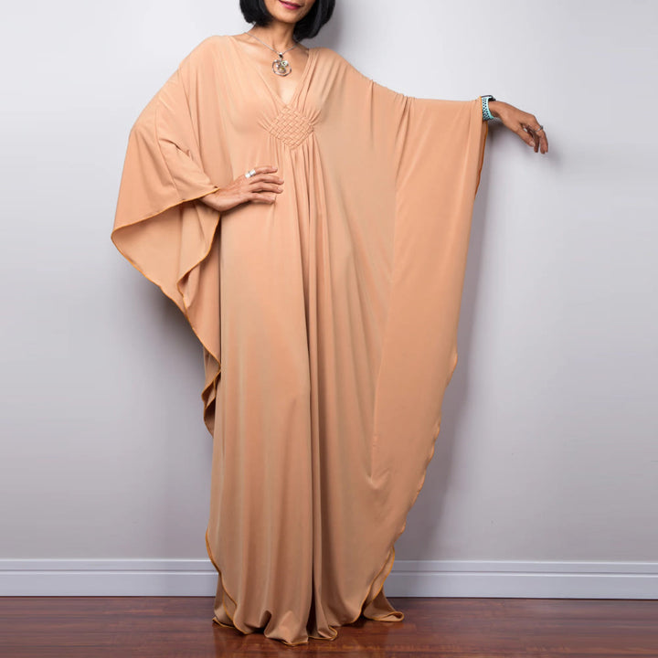 Vestido caftán con diseño tejido y camisa de protección solar de Olivenorma Beach