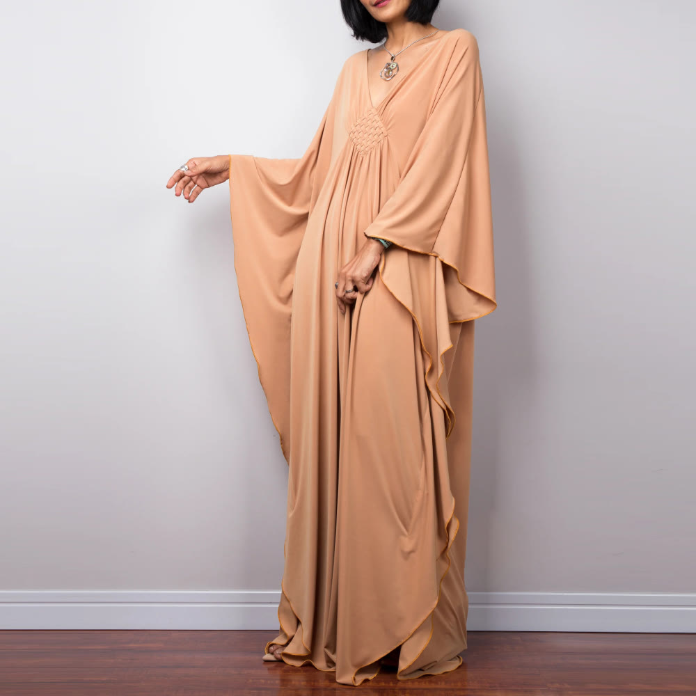 Vestido caftán con diseño tejido y camisa de protección solar de Olivenorma Beach