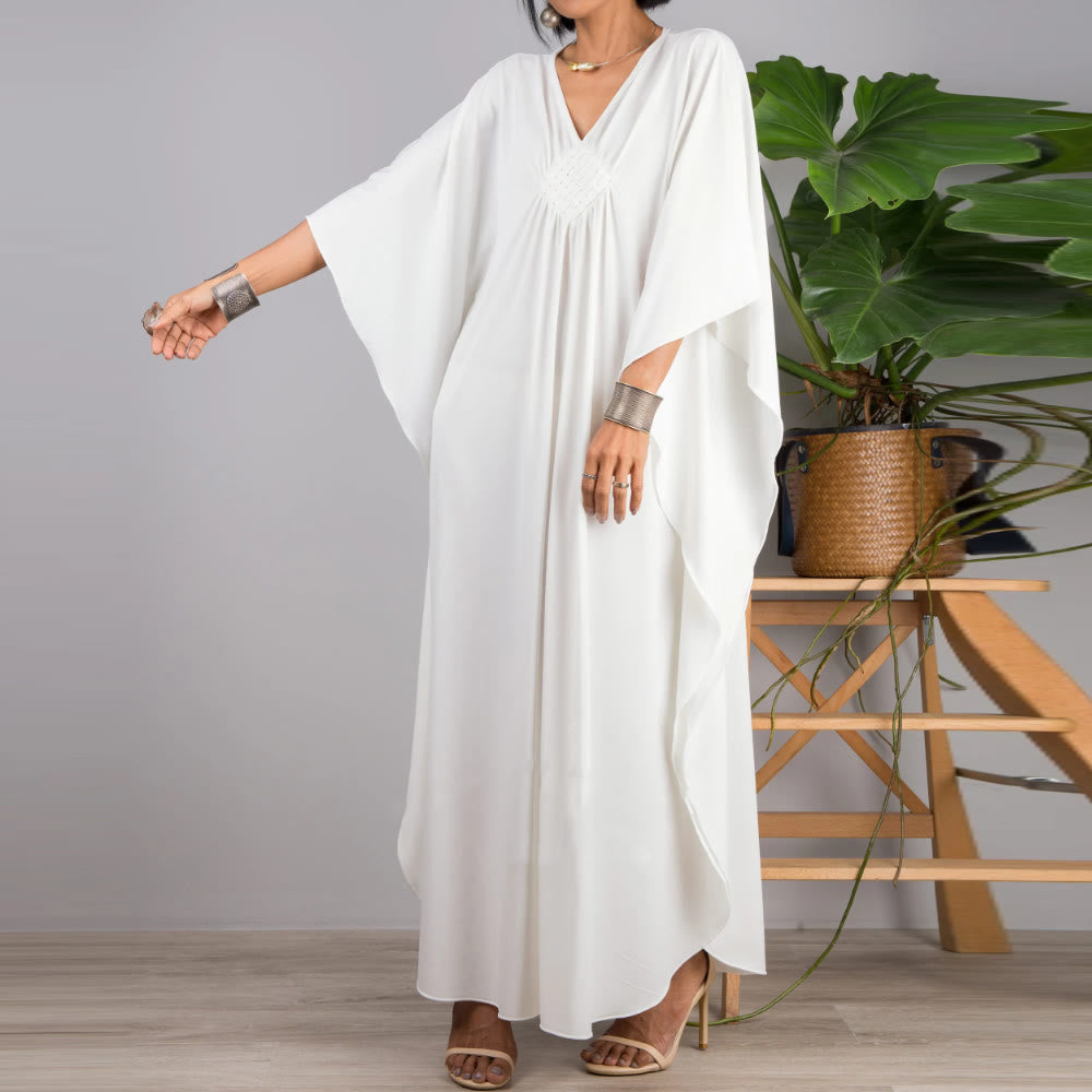 Vestido caftán con diseño tejido y camisa de protección solar de Olivenorma Beach