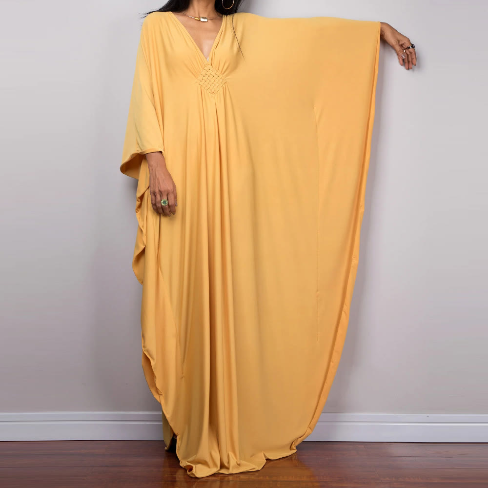 Vestido caftán con diseño tejido y camisa de protección solar de Olivenorma Beach