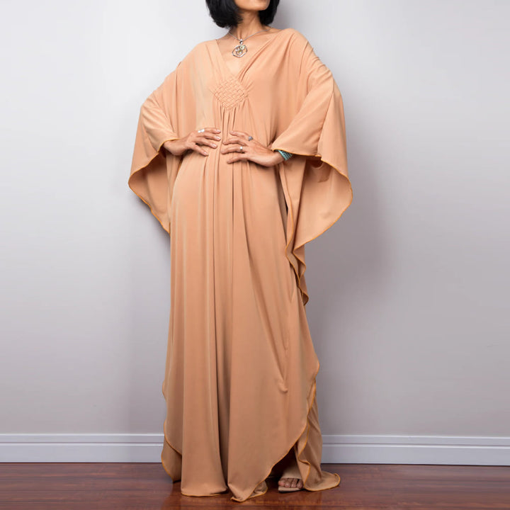 Vestido caftán con diseño tejido y camisa de protección solar de Olivenorma Beach