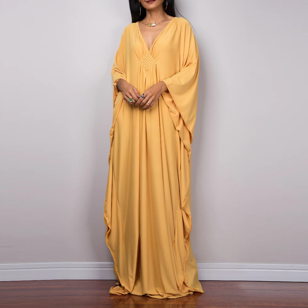 Vestido caftán con diseño tejido y camisa de protección solar de Olivenorma Beach