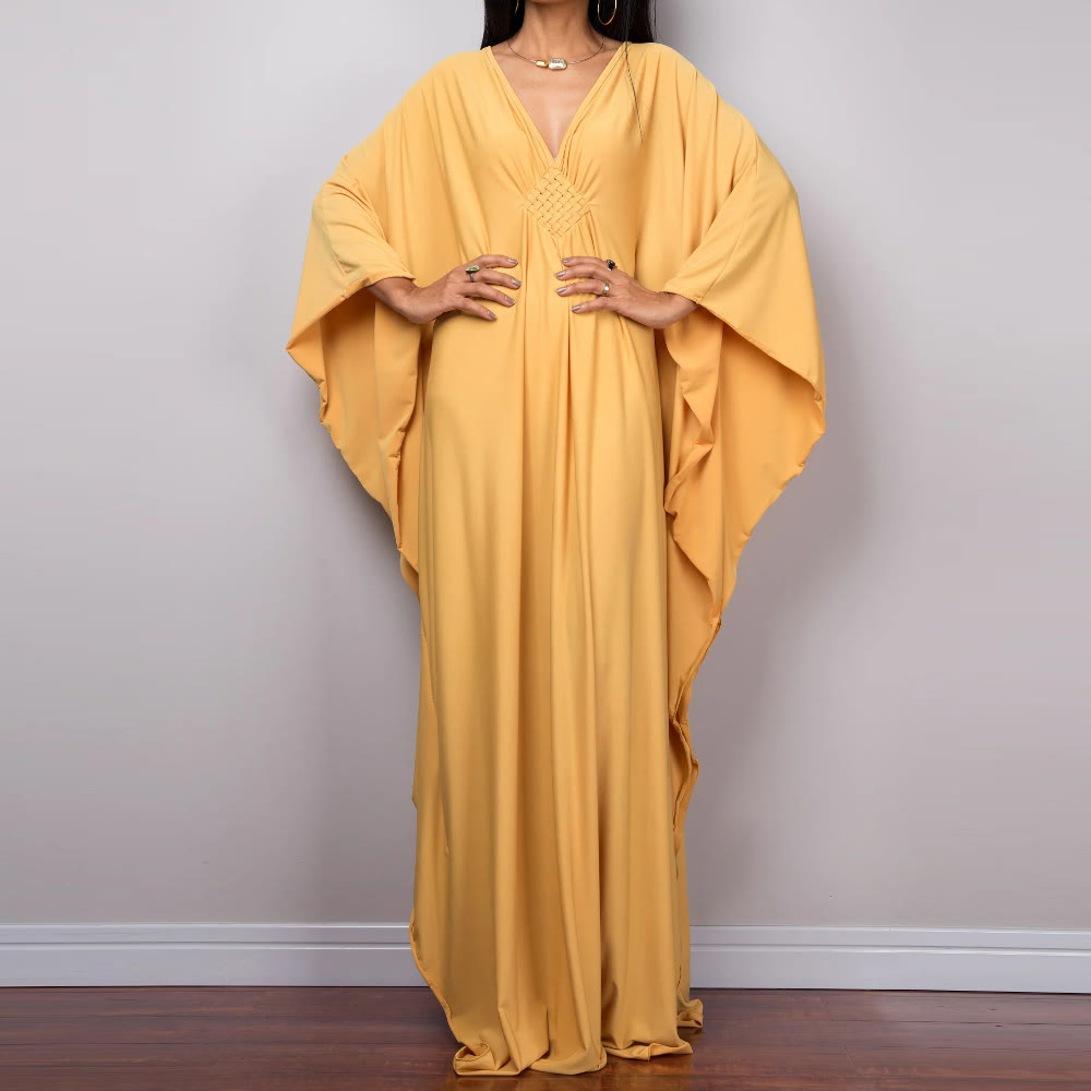 Vestido caftán con diseño tejido y camisa de protección solar de Olivenorma Beach