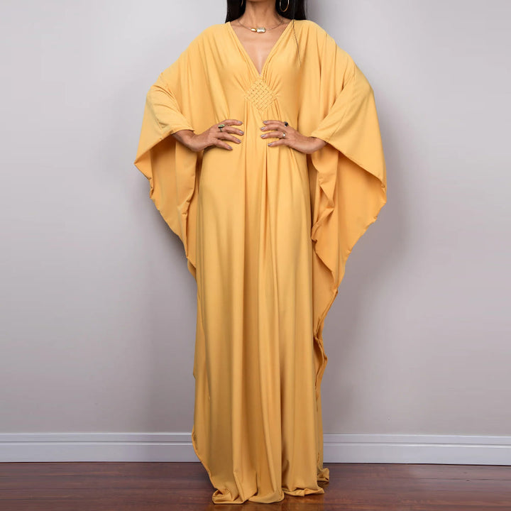 Vestido caftán con diseño tejido y camisa de protección solar de Olivenorma Beach
