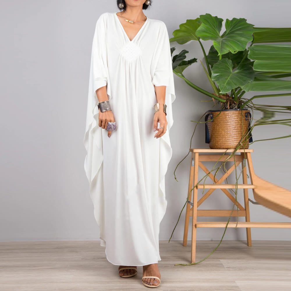 Vestido caftán con diseño tejido y camisa de protección solar de Olivenorma Beach