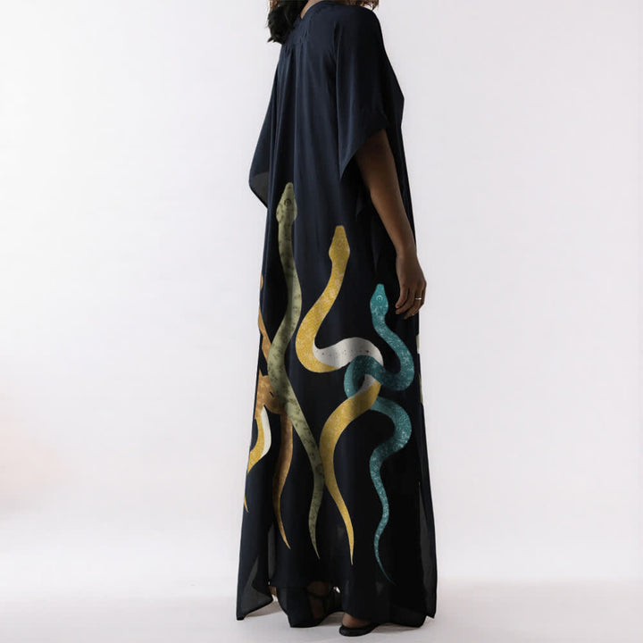 Vestido caftán negro con serpiente de Olivenorma