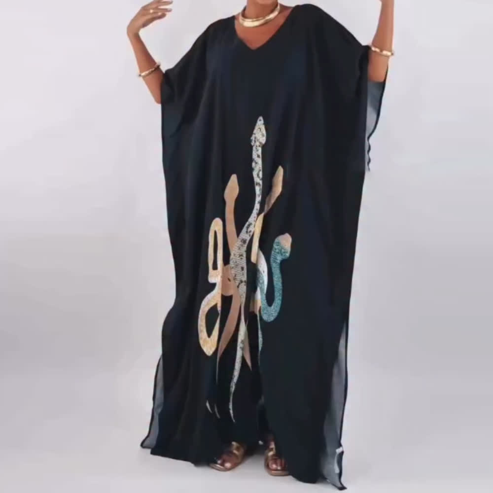 Vestido caftán negro con serpiente de Olivenorma