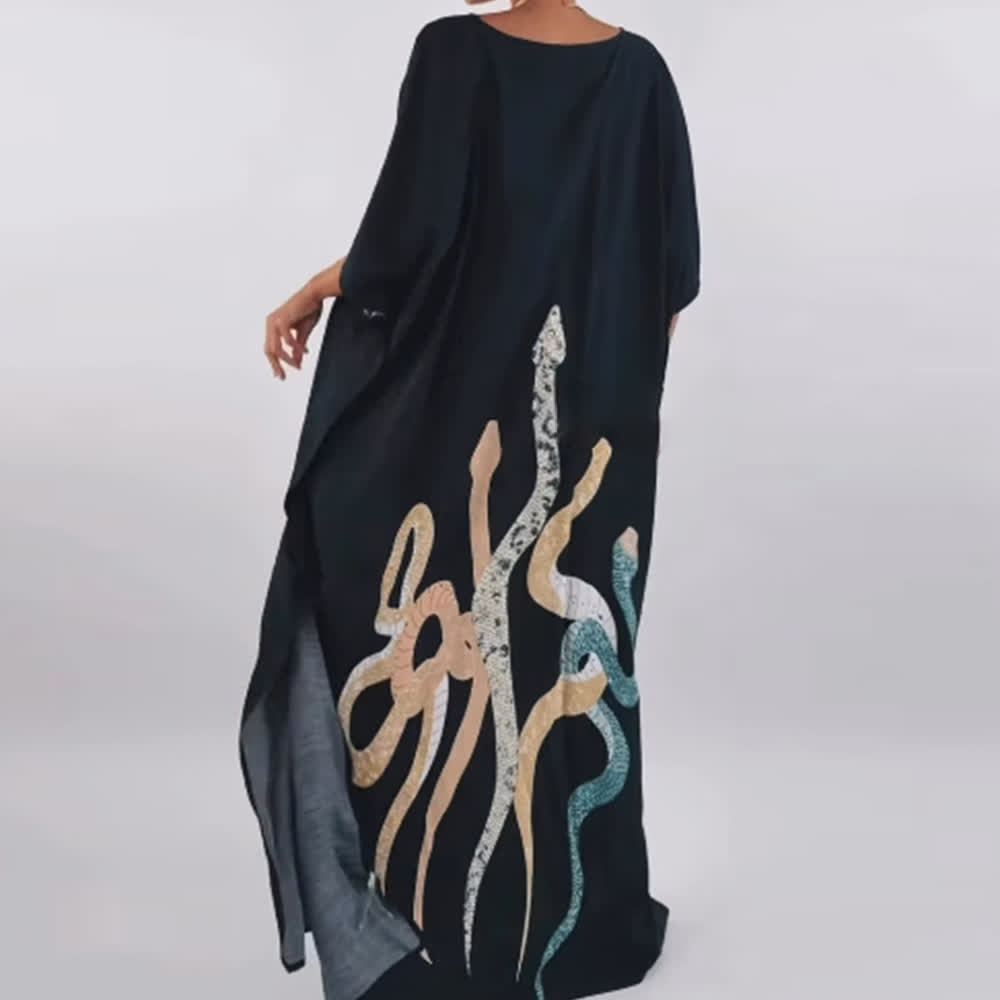 Vestido caftán negro con serpiente de Olivenorma