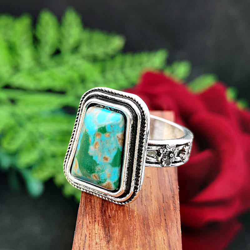 Anillo de plata con rosa en relieve bañado en piedra del emperador Olivenorma 