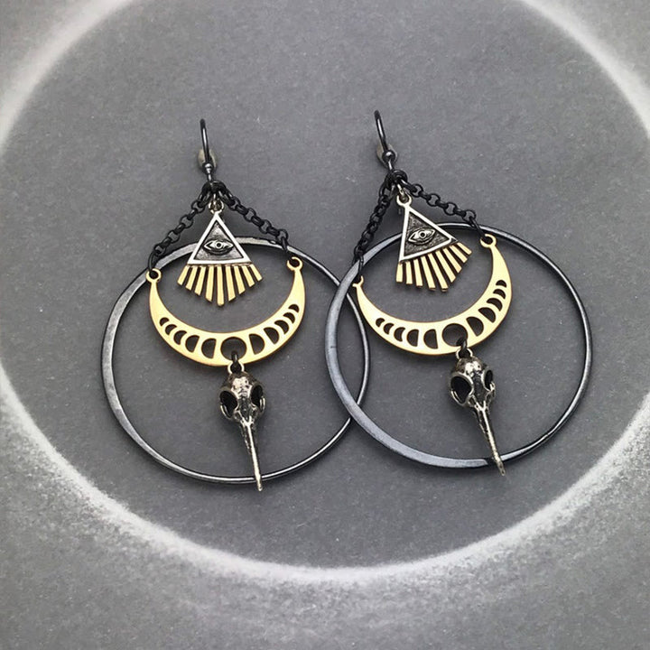Pendientes de calavera de cuervo con fase lunar y ojo malvado de Olivenorma