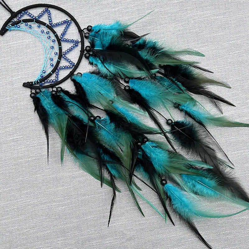 Atrapasueños de plumas negras con cuentas de color morado y azul de Olivenorma
