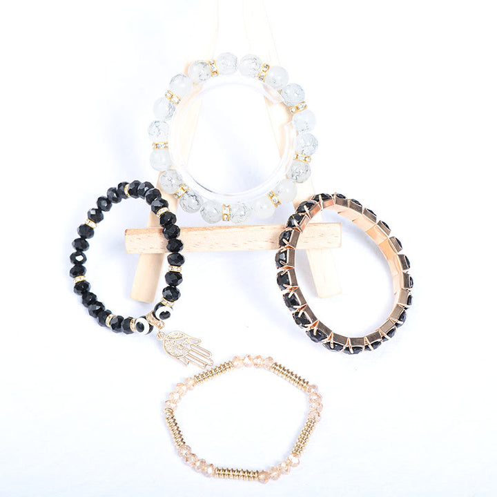 Juego de pulseras de cuentas de cuatro capas con ojo turco y hamsa de Olivenorma 