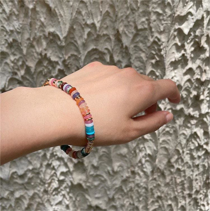 Pulsera y collar con piedras preciosas y cuentas redondas de cristal mixtas estilo bohemio de Olivenorma 