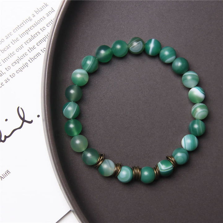Pulsera elástica de yoga con cuentas de piedra natural pulida de 8 mm de Olivenorma