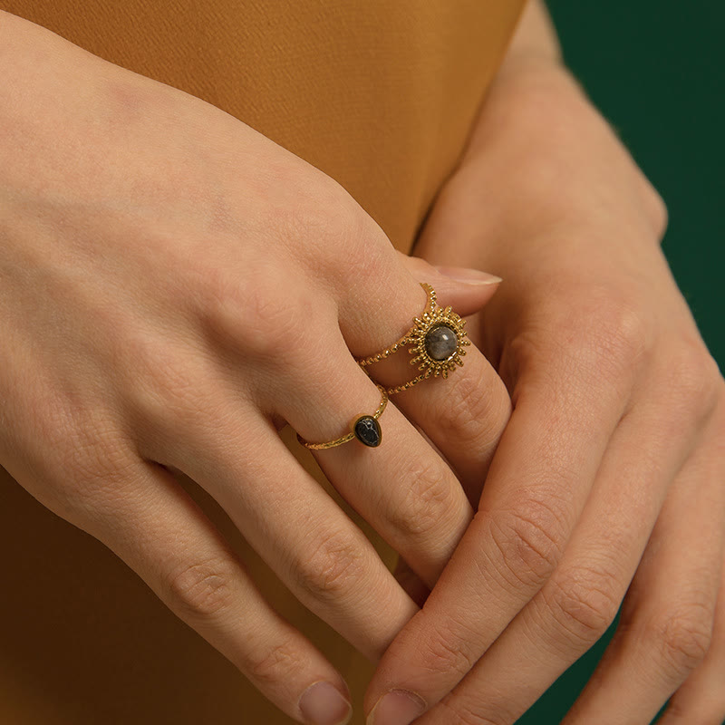 Anillo de gemas con estrella de ocho puntas y doble hilera de girasol de Olivenorma