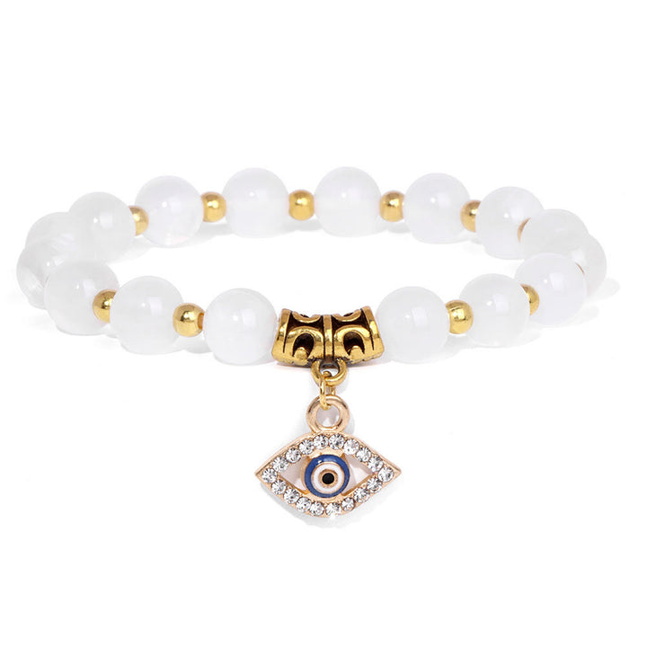 Pulsera con colgante de ojo malvado y cuentas de piedra natural de Olivenorma
