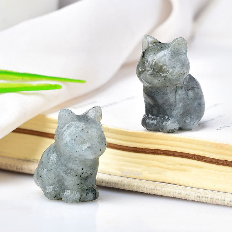 Artesanías con talladas de piedras preciosas y gatitos de cristal de Olivenorma.