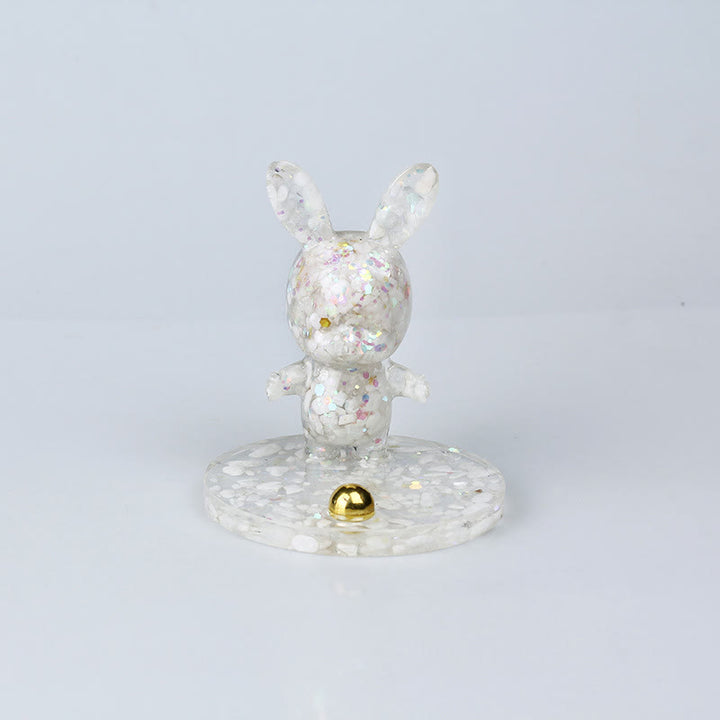 Soporte para teléfono móvil con forma de conejo de epoxi y grava de cristal natural de Olivenorma