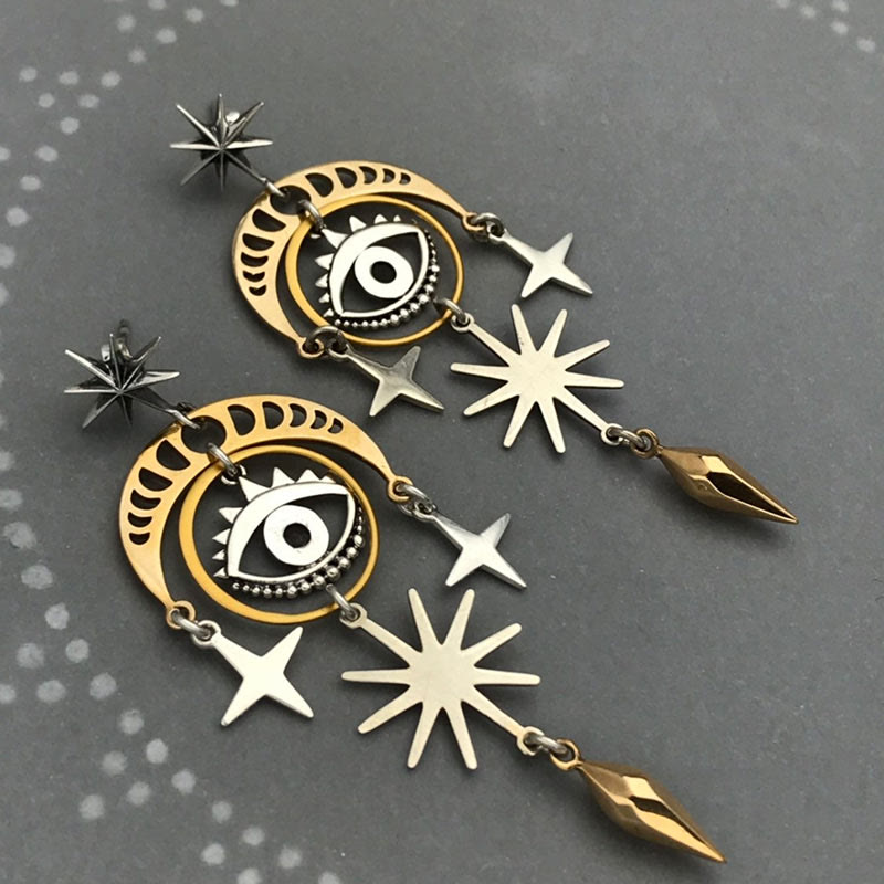Pendientes de bruja con luna, estrella y ojo malvado de Olivenorma