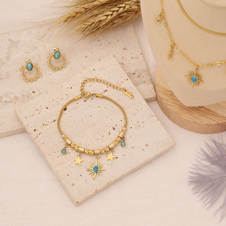 Collar, pulsera y pendientes con colgante de estrella y sol turquesa de Olivenorma
