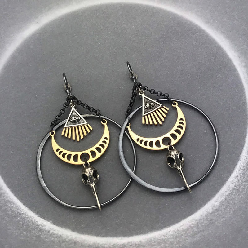 Pendientes de calavera de cuervo con fase lunar y ojo malvado de Olivenorma