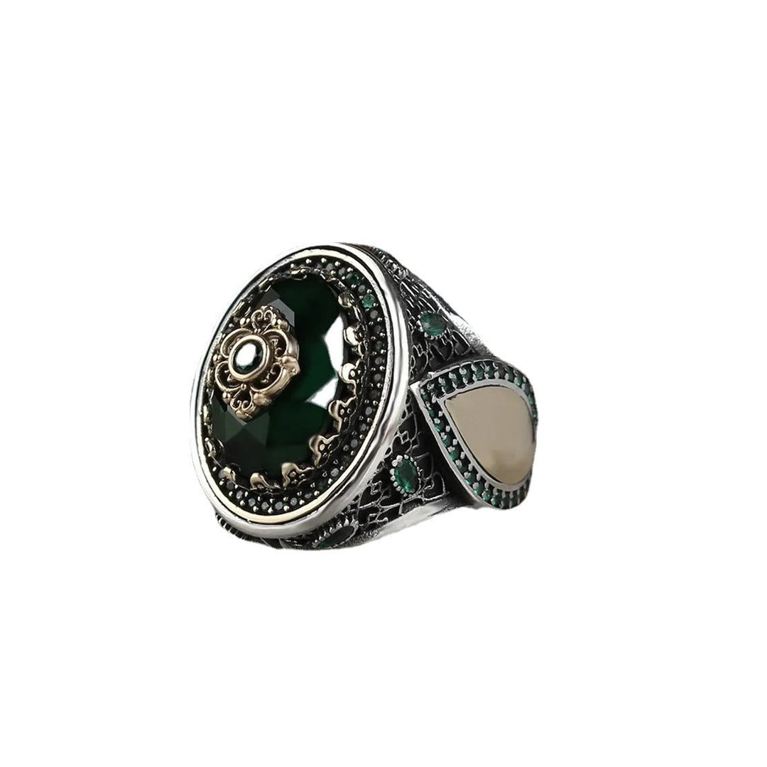 Anillo apilable con esmeralda y gota de agua de Olivenorma 
