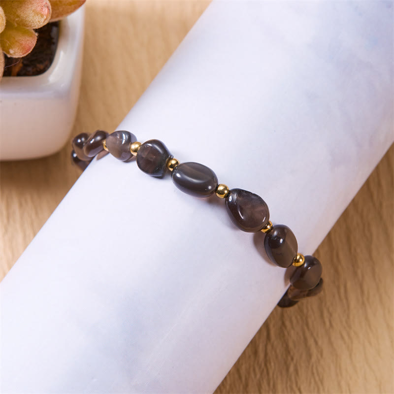 Pulsera tejida a mano con cuentas de piedra irregulares naturales de Olivenorma