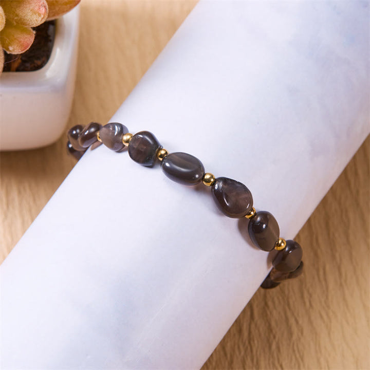 Pulsera tejida a mano con cuentas de piedra irregulares naturales de Olivenorma