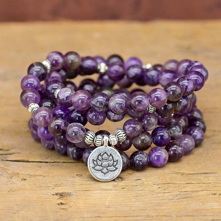 Collar y pulsera con símbolo de loto y amatista de Olivenorma 
