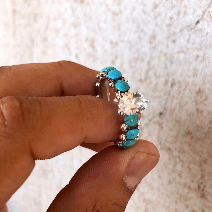 Anillo de compromiso con diamantes y circonita blanca turquesa de Olivenorma