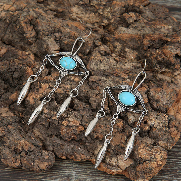 Pendientes bohemios con turquesa y ojo recortado geométrico de Olivenorma