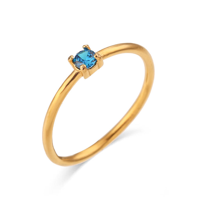 Anillo de acero inoxidable chapado en oro de 18 quilates con piedra natal simple de Olivenorma