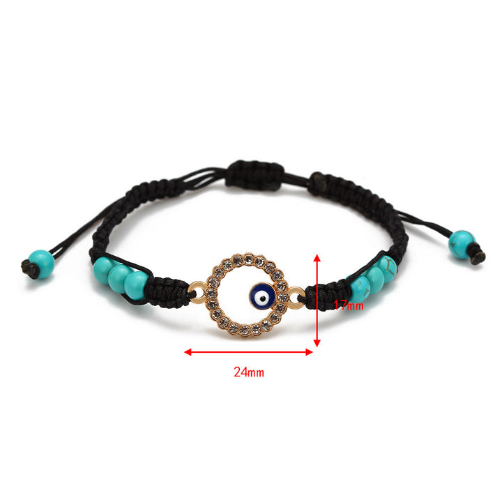 Pulsera trenzada ajustable con ojo malvado y circonita blanca y turquesa de Olivenorma 