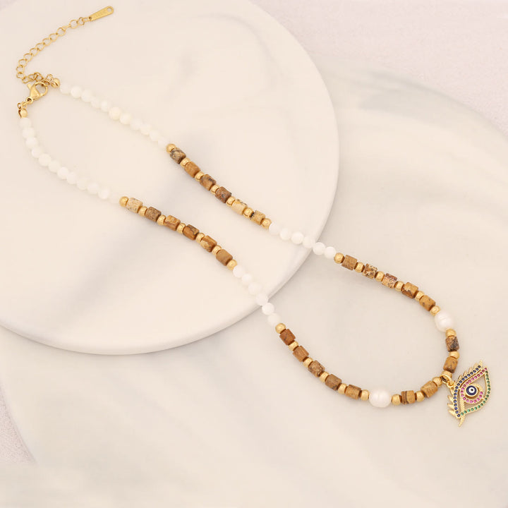Collar con colgante de ojo malvado con piedra de cristal y perla natural de Olivenorma